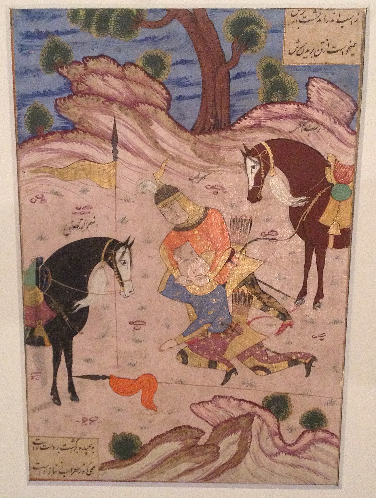 Manuscript painting of an armoured warrior standing over a fallen opponent between two horses in a pink rocky landscape